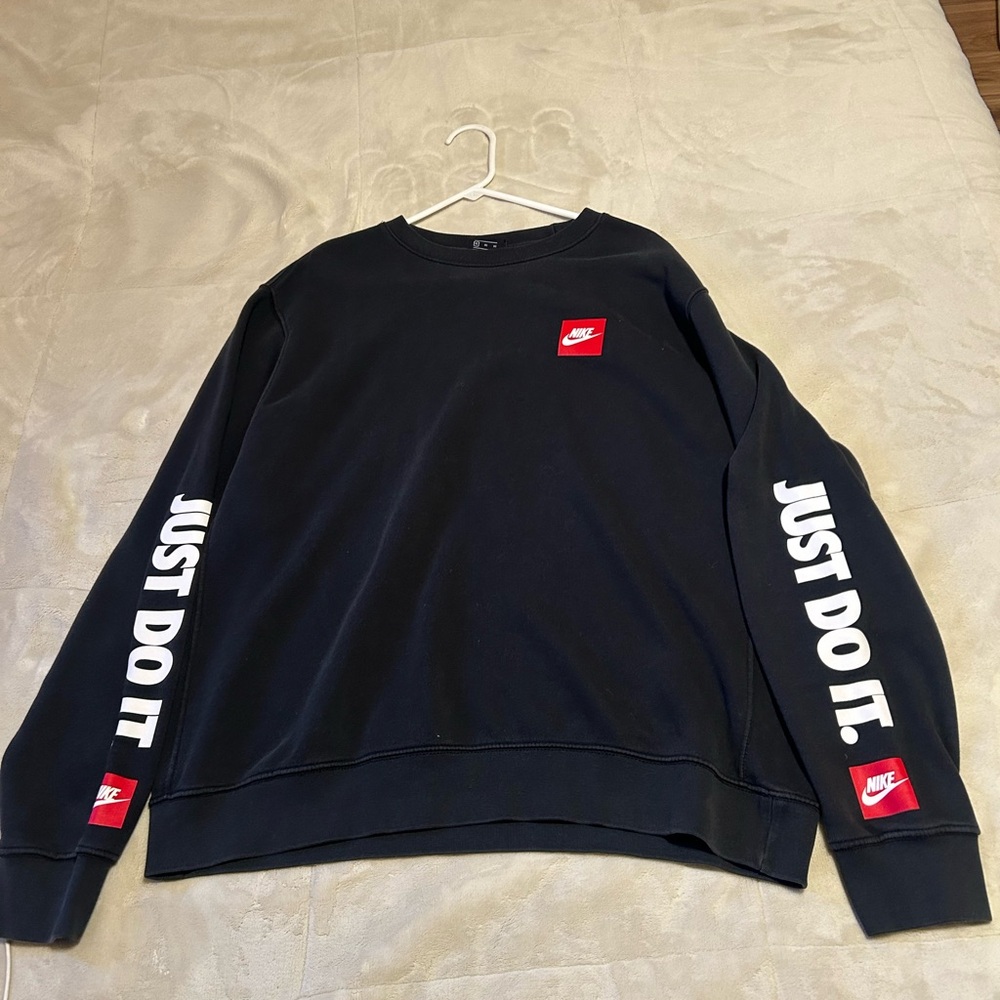 Nike Men's Black Crewneck Sweater with Red Accents